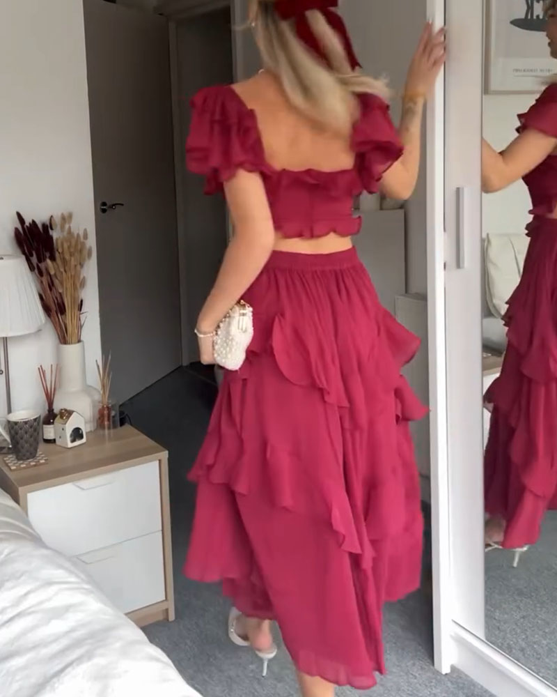 ISABELLA – ROMANTISCHE CASCADE RUFFLE JURK