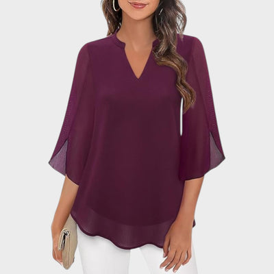 ELENA – ELEGANTE BLOUSE MET V-HALS EN LUCHTIGE UITSTRALING