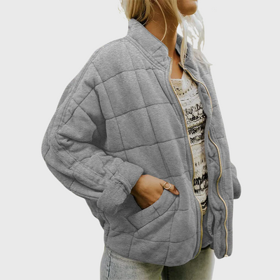 PIA – GEWATTEERD VEST MET RITS