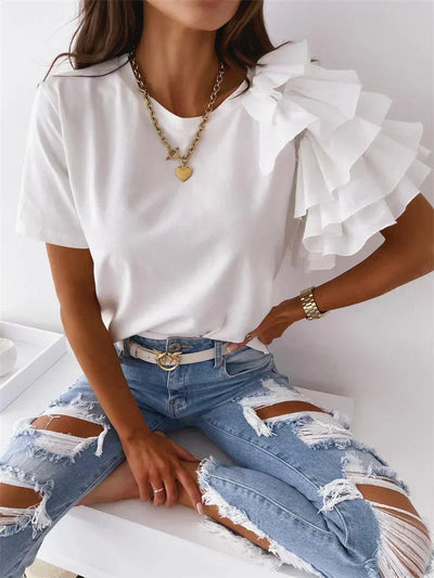 Anna™ | Trendy top met statement rufflemouw