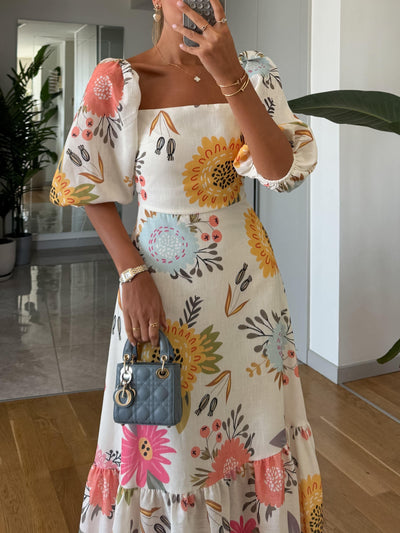 CAMILLE – BLOEIENDE ELEGANTIE JURK MET PUFFMOUWEN
